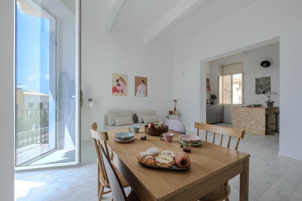 Lunch laid out with the balcony in view and the kitchen behind